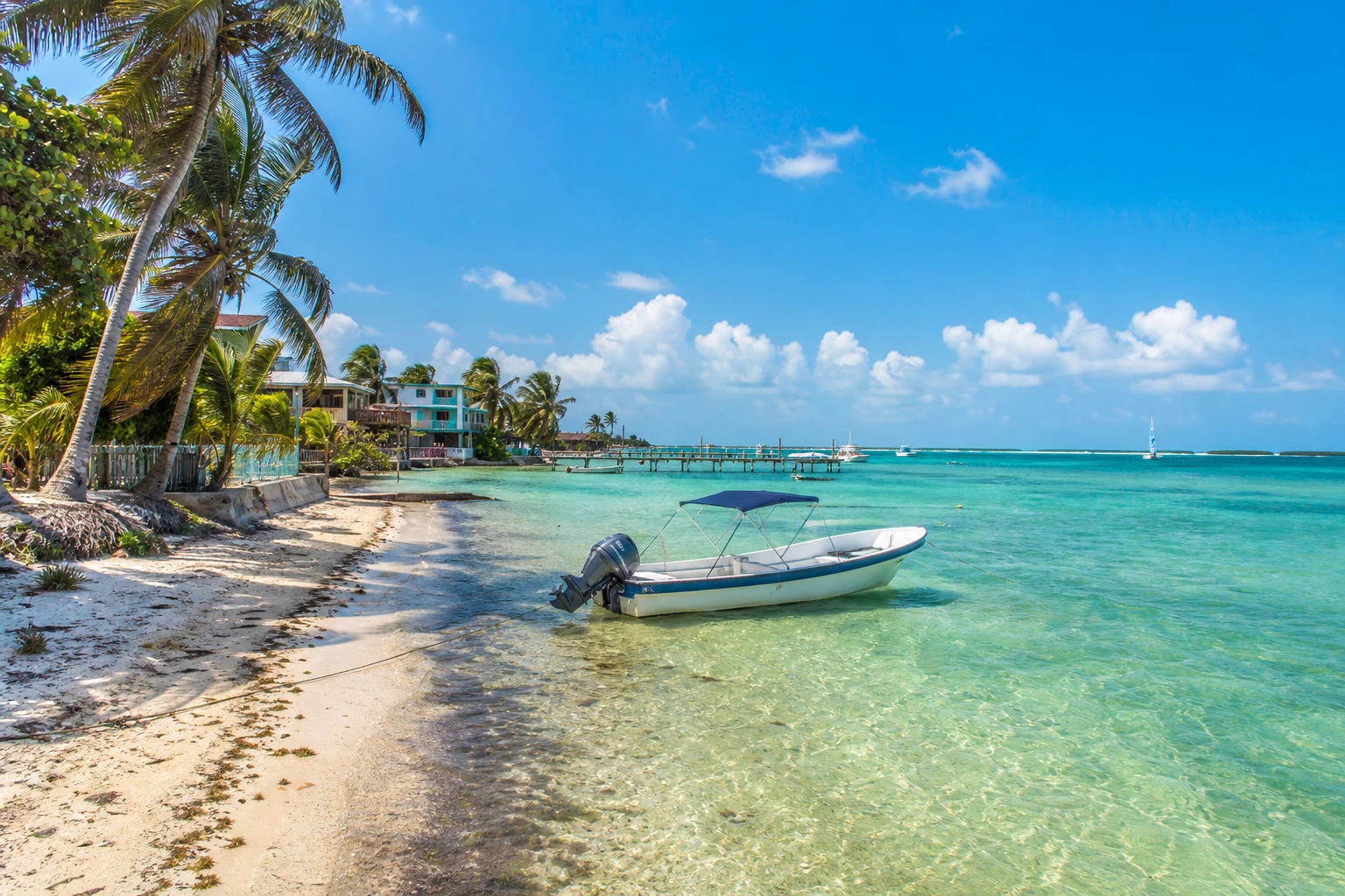 Caribbean shoreline and boats on Ambergris Caye near San Pedro, Belize
