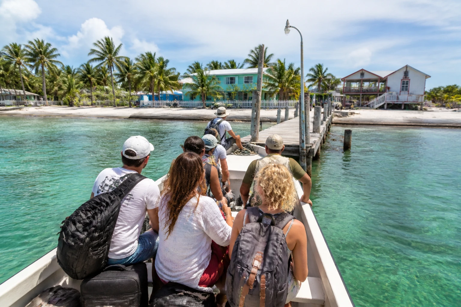 Water taxi arriving at an island dock in Belize