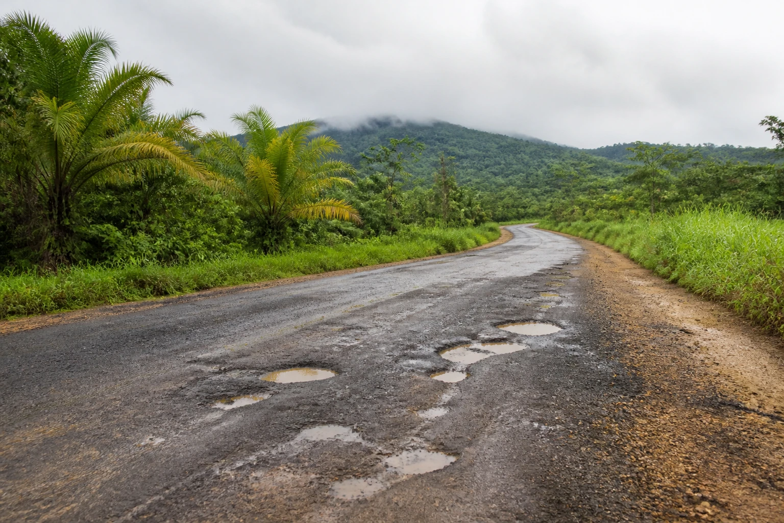 Variable road surface on a rural Belize drive