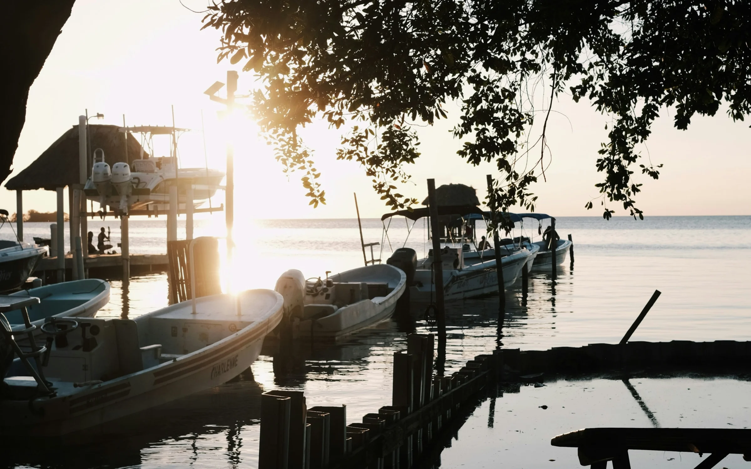 Caye Caulker wooden dock over turquoise Caribbean water