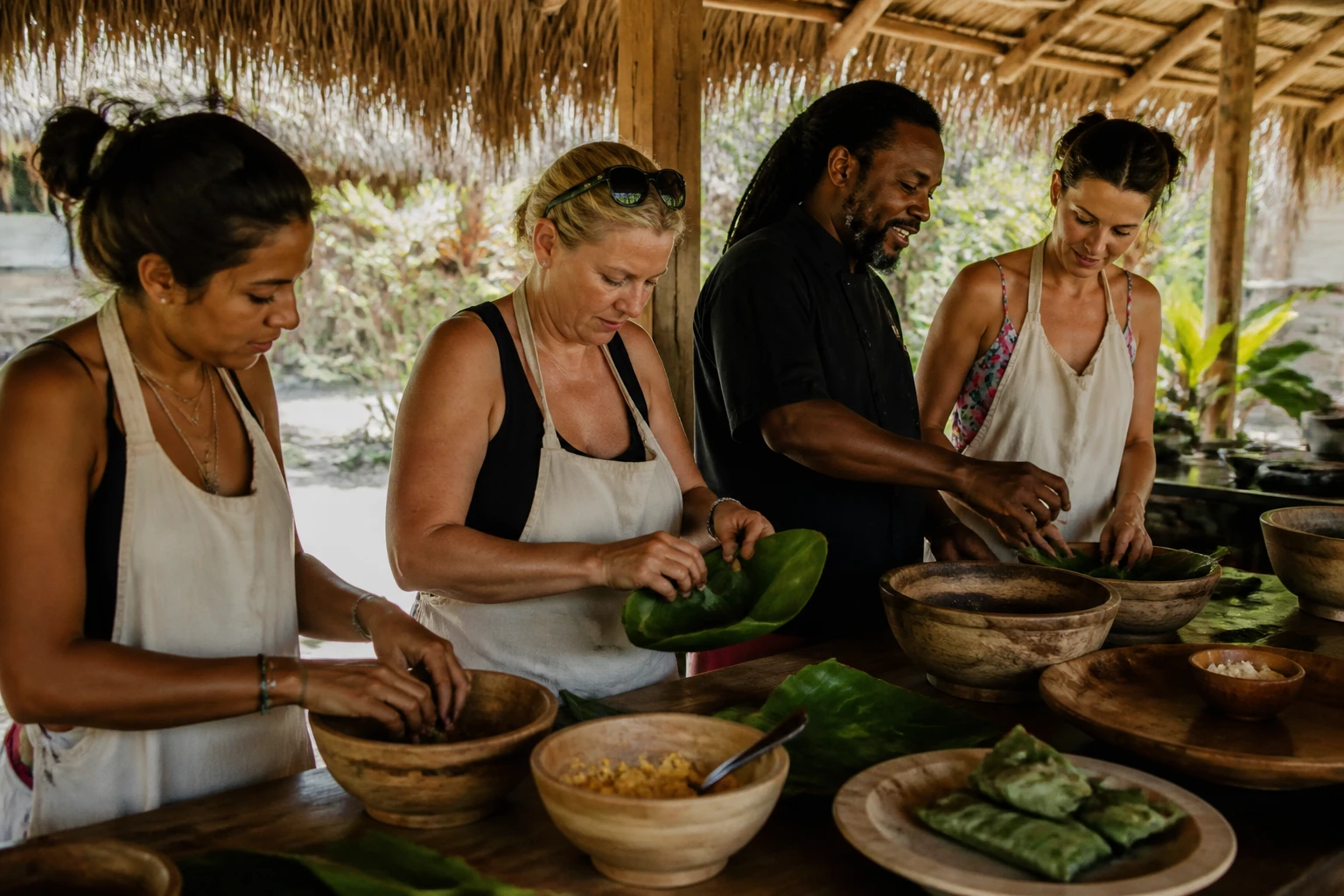 Travelers participating in a cooking class in Belize