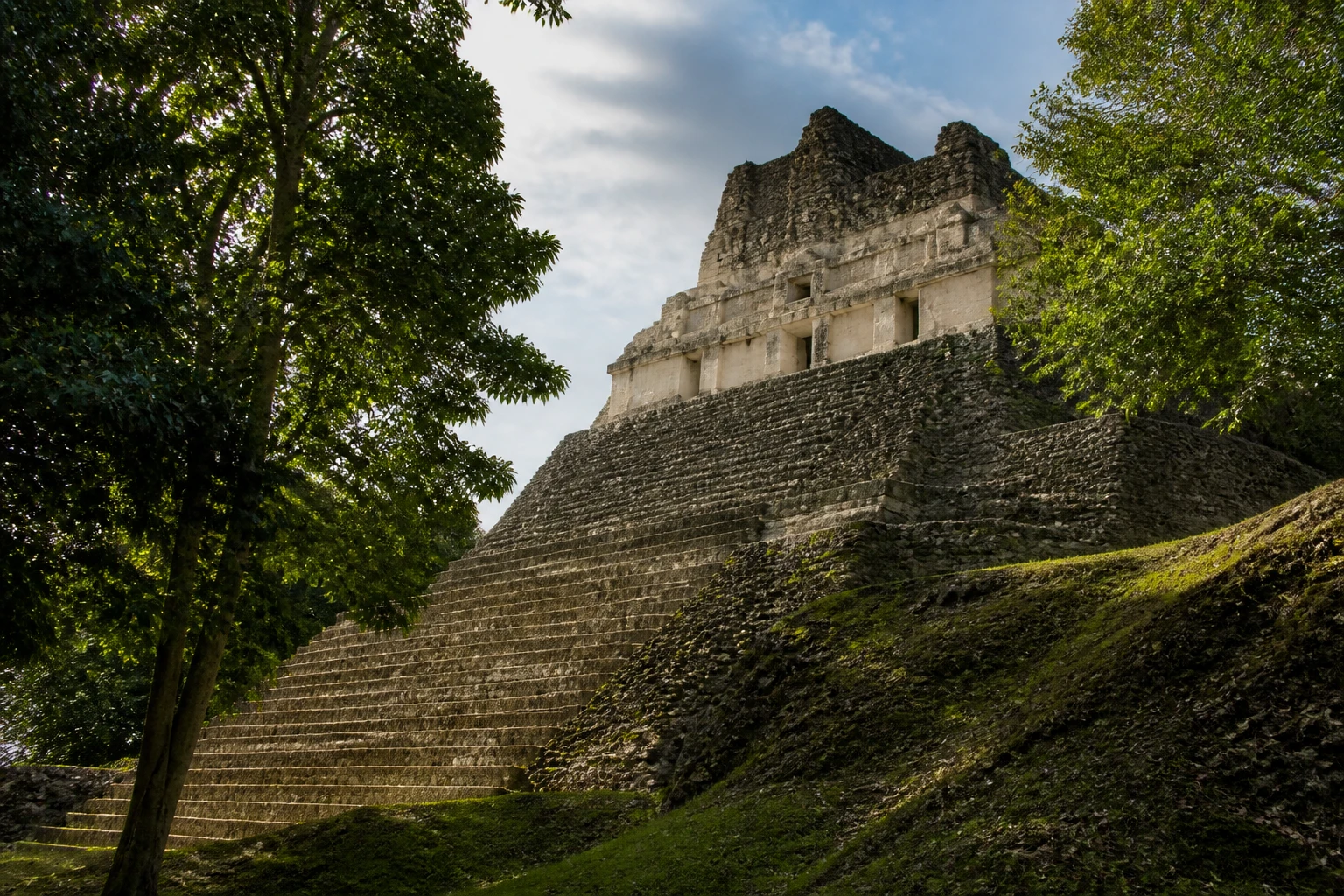 El Castillo at Xunantunich rising above Belizean jungle