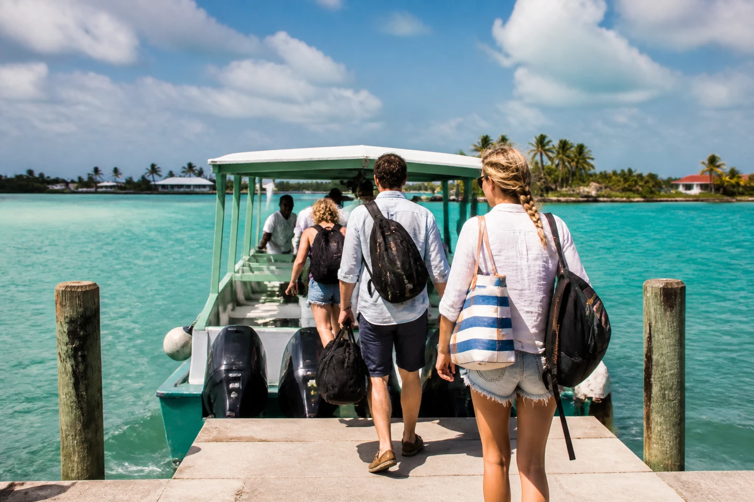 Travelers boarding a water taxi in Belize